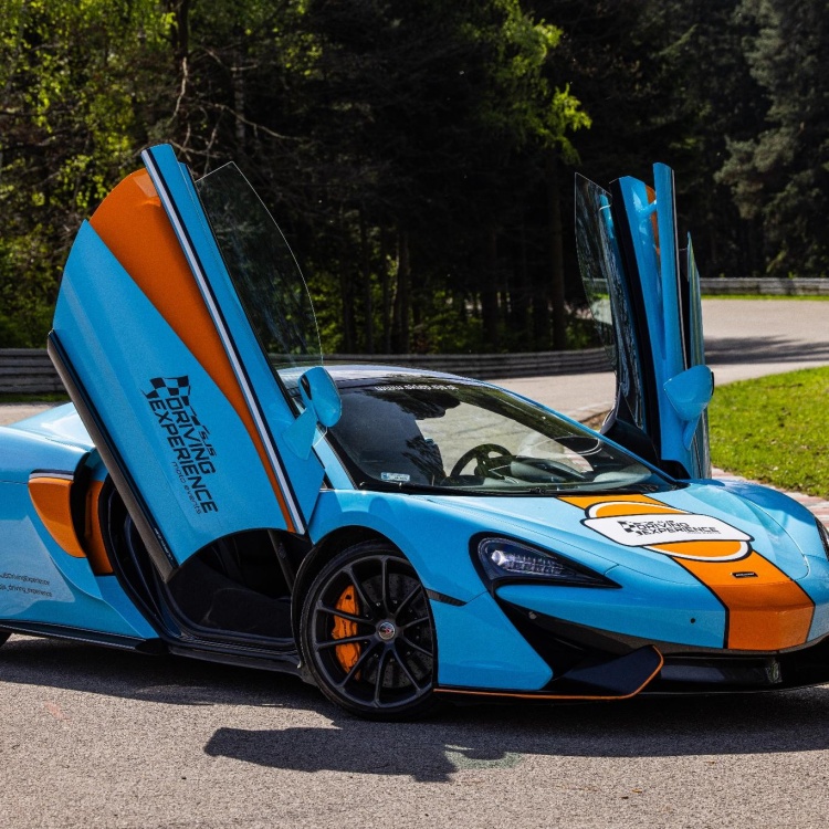 McLaren 570GT  niebiesko-pomarańczowy drzwi do góry